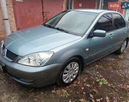 Зеленый Мицубиси Лансер, объемом двигателя 1.6 л и пробегом 219 тыс. км за 5300 $, фото 2 на Automoto.ua