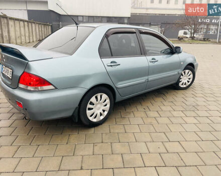 Зеленый Мицубиси Лансер, объемом двигателя 1.6 л и пробегом 164 тыс. км за 5000 $, фото 3 на Automoto.ua