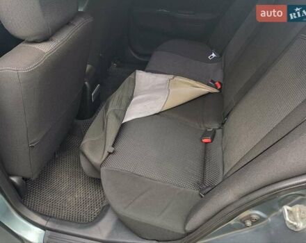 Зелений Міцубісі Lancer, об'ємом двигуна 1.6 л та пробігом 219 тис. км за 4700 $, фото 10 на Automoto.ua