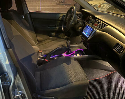 Зелений Міцубісі Lancer, об'ємом двигуна 1.58 л та пробігом 276 тис. км за 3400 $, фото 9 на Automoto.ua