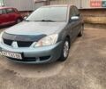 Зелений Міцубісі Lancer, об'ємом двигуна 1.58 л та пробігом 206 тис. км за 4450 $, фото 1 на Automoto.ua