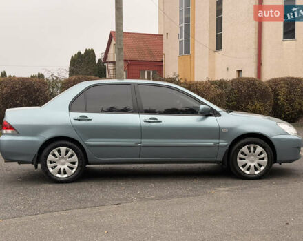 Зеленый Мицубиси Лансер, объемом двигателя 1.6 л и пробегом 214 тыс. км за 4150 $, фото 7 на Automoto.ua