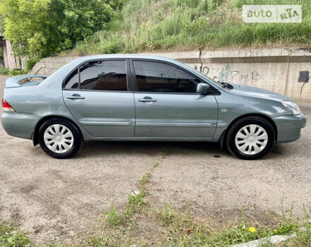 Зелений Міцубісі Lancer, об'ємом двигуна 1.6 л та пробігом 220 тис. км за 4750 $, фото 8 на Automoto.ua