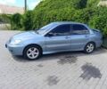 Зелений Міцубісі Lancer, об'ємом двигуна 1.6 л та пробігом 230 тис. км за 3300 $, фото 1 на Automoto.ua