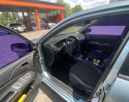 Зелений Міцубісі Lancer, об'ємом двигуна 1.58 л та пробігом 220 тис. км за 4500 $, фото 8 на Automoto.ua