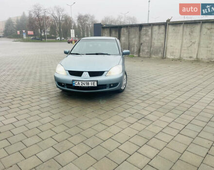 Зеленый Мицубиси Лансер, объемом двигателя 1.6 л и пробегом 164 тыс. км за 5000 $, фото 5 на Automoto.ua