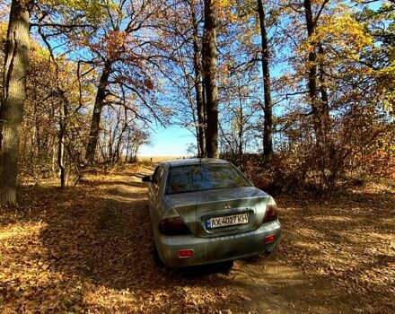 Зеленый Мицубиси Лансер, объемом двигателя 1.6 л и пробегом 238 тыс. км за 4000 $, фото 2 на Automoto.ua