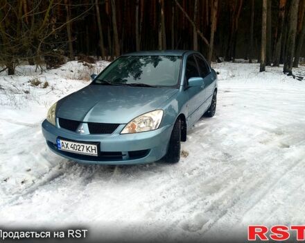 Зелений Міцубісі Lancer, об'ємом двигуна 1.6 л та пробігом 219 тис. км за 4800 $, фото 9 на Automoto.ua