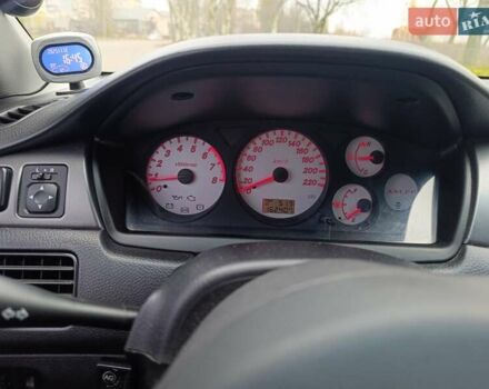 Зелений Міцубісі Lancer, об'ємом двигуна 1.6 л та пробігом 162 тис. км за 4700 $, фото 14 на Automoto.ua