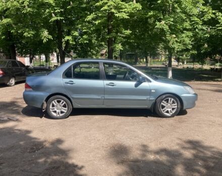 Зелений Міцубісі Lancer, об'ємом двигуна 0.16 л та пробігом 262 тис. км за 4600 $, фото 1 на Automoto.ua