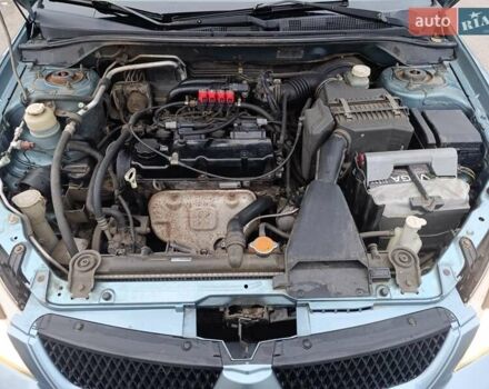 Зелений Міцубісі Lancer, об'ємом двигуна 1.6 л та пробігом 162 тис. км за 4700 $, фото 13 на Automoto.ua