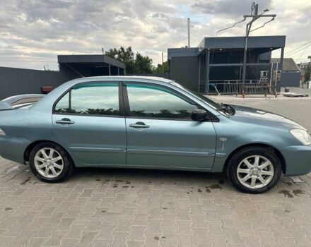 Зеленый Мицубиси Лансер, объемом двигателя 1.6 л и пробегом 300 тыс. км за 3800 $, фото 4 на Automoto.ua