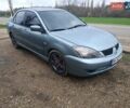 Зелений Міцубісі Lancer, об'ємом двигуна 2 л та пробігом 238 тис. км за 2999 $, фото 1 на Automoto.ua
