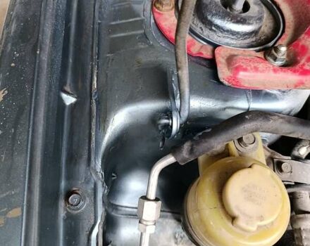 Зелений Міцубісі Lancer, об'ємом двигуна 2 л та пробігом 238 тис. км за 2999 $, фото 6 на Automoto.ua