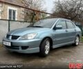 Зелений Міцубісі Lancer, об'ємом двигуна 2 л та пробігом 225 тис. км за 5600 $, фото 9 на Automoto.ua