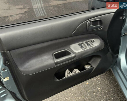 Зеленый Мицубиси Лансер, объемом двигателя 1.6 л и пробегом 214 тыс. км за 4150 $, фото 28 на Automoto.ua