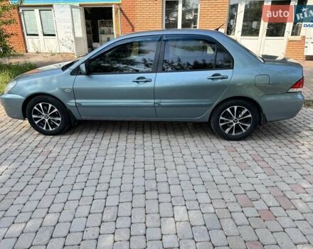 Зеленый Мицубиси Лансер, объемом двигателя 1.6 л и пробегом 137 тыс. км за 5500 $, фото 5 на Automoto.ua