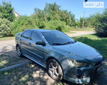 Зелений Міцубісі Lancer, об'ємом двигуна 1.9 л та пробігом 204 тис. км за 7000 $, фото 10 на Automoto.ua