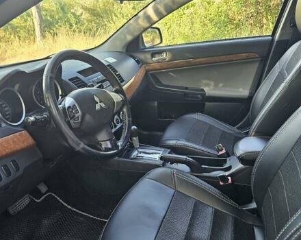 Зелений Міцубісі Lancer, об'ємом двигуна 1.47 л та пробігом 215 тис. км за 5000 $, фото 21 на Automoto.ua