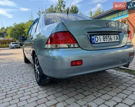 Зеленый Мицубиси Лансер, объемом двигателя 1.6 л и пробегом 137 тыс. км за 5500 $, фото 29 на Automoto.ua