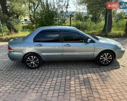 Зеленый Мицубиси Лансер, объемом двигателя 1.6 л и пробегом 137 тыс. км за 5500 $, фото 11 на Automoto.ua