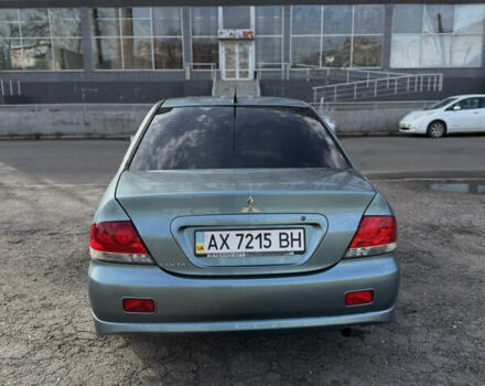 Зелений Міцубісі Lancer, об'ємом двигуна 1.6 л та пробігом 164 тис. км за 6000 $, фото 5 на Automoto.ua