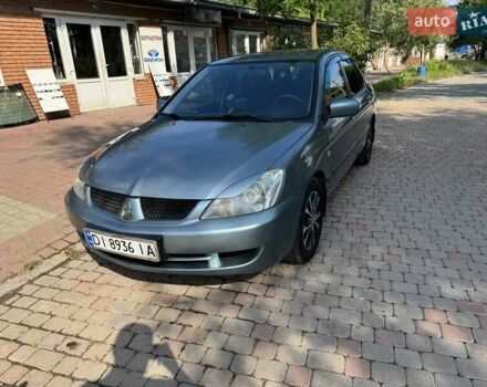 Зеленый Мицубиси Лансер, объемом двигателя 1.6 л и пробегом 137 тыс. км за 5500 $, фото 3 на Automoto.ua