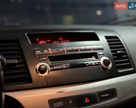 Зеленый Мицубиси Лансер, объемом двигателя 1.5 л и пробегом 260 тыс. км за 3750 $, фото 13 на Automoto.ua