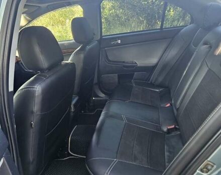 Зелений Міцубісі Lancer, об'ємом двигуна 1.47 л та пробігом 215 тис. км за 5000 $, фото 20 на Automoto.ua
