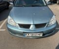 Зелений Міцубісі Lancer, об'ємом двигуна 1.58 л та пробігом 313 тис. км за 4000 $, фото 1 на Automoto.ua