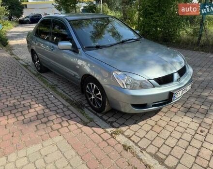 Зеленый Мицубиси Лансер, объемом двигателя 1.6 л и пробегом 137 тыс. км за 5500 $, фото 1 на Automoto.ua