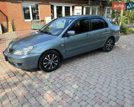 Зеленый Мицубиси Лансер, объемом двигателя 1.6 л и пробегом 137 тыс. км за 5500 $, фото 4 на Automoto.ua