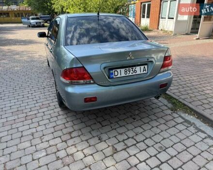 Зеленый Мицубиси Лансер, объемом двигателя 1.6 л и пробегом 137 тыс. км за 5500 $, фото 7 на Automoto.ua
