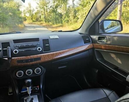 Зелений Міцубісі Lancer, об'ємом двигуна 1.47 л та пробігом 215 тис. км за 5000 $, фото 15 на Automoto.ua