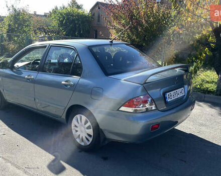 Зеленый Мицубиси Лансер, объемом двигателя 1.58 л и пробегом 180 тыс. км за 4800 $, фото 3 на Automoto.ua