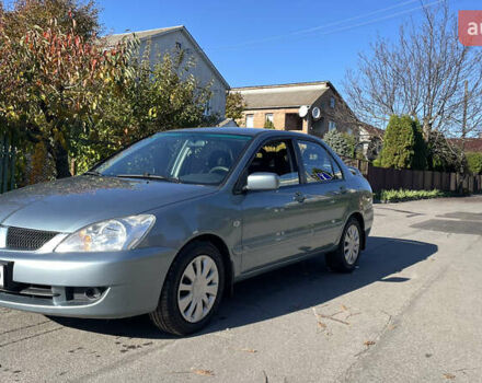 Зеленый Мицубиси Лансер, объемом двигателя 1.58 л и пробегом 180 тыс. км за 4800 $, фото 2 на Automoto.ua