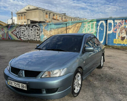 Зелений Міцубісі Lancer, об'ємом двигуна 1.6 л та пробігом 164 тис. км за 6000 $, фото 2 на Automoto.ua