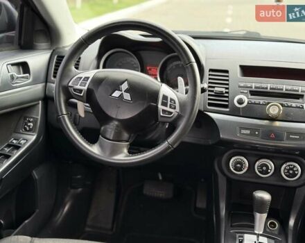 Зеленый Мицубиси Лансер, объемом двигателя 2 л и пробегом 177 тыс. км за 7200 $, фото 12 на Automoto.ua