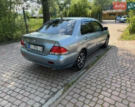 Зеленый Мицубиси Лансер, объемом двигателя 1.6 л и пробегом 137 тыс. км за 5500 $, фото 9 на Automoto.ua