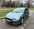 Зелений Міцубісі Lancer, об'ємом двигуна 2 л та пробігом 135 тис. км за 5700 $, фото 1 на Automoto.ua