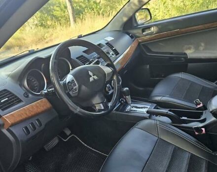 Зелений Міцубісі Lancer, об'ємом двигуна 1.47 л та пробігом 215 тис. км за 5000 $, фото 19 на Automoto.ua