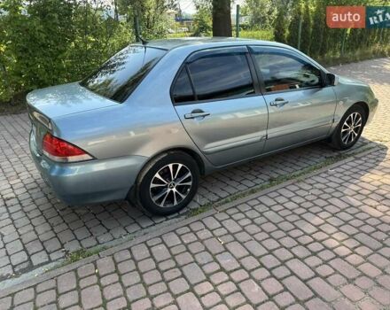 Зеленый Мицубиси Лансер, объемом двигателя 1.6 л и пробегом 137 тыс. км за 5500 $, фото 10 на Automoto.ua