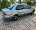 Зеленый Мицубиси Лансер, объемом двигателя 1.6 л и пробегом 137 тыс. км за 5500 $, фото 10 на Automoto.ua