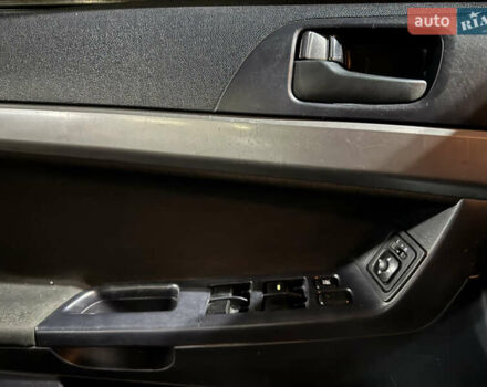 Зеленый Мицубиси Лансер, объемом двигателя 1.5 л и пробегом 260 тыс. км за 3750 $, фото 18 на Automoto.ua