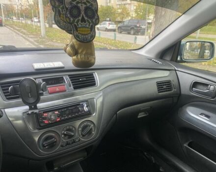 Зеленый Мицубиси Лансер, объемом двигателя 1.6 л и пробегом 167 тыс. км за 3500 $, фото 8 на Automoto.ua