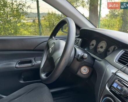 Зеленый Мицубиси Лансер, объемом двигателя 1.6 л и пробегом 137 тыс. км за 5500 $, фото 16 на Automoto.ua