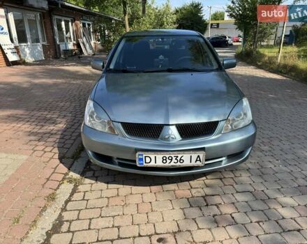 Зеленый Мицубиси Лансер, объемом двигателя 1.6 л и пробегом 137 тыс. км за 5500 $, фото 2 на Automoto.ua