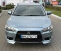 Зеленый Мицубиси Лансер, объемом двигателя 2 л и пробегом 177 тыс. км за 7200 $, фото 1 на Automoto.ua