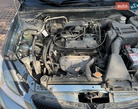 Зеленый Мицубиси Лансер, объемом двигателя 1.6 л и пробегом 137 тыс. км за 5500 $, фото 26 на Automoto.ua