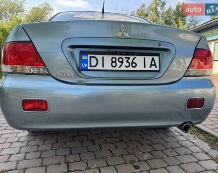 Зеленый Мицубиси Лансер, объемом двигателя 1.6 л и пробегом 137 тыс. км за 5500 $, фото 28 на Automoto.ua
